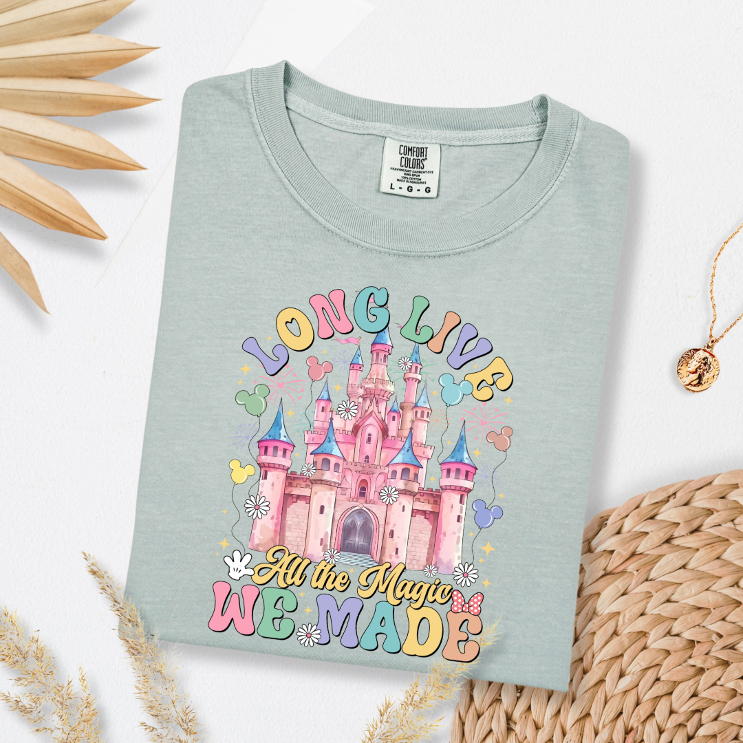 Customized adult comfort colors Bay green t-shirt with long live multi color long live bubble letters large castle in the middle with Mickey Mouse shaped balloons and flowers surrounding. Matching crewnecks and hoodies available in youth and adult sizes