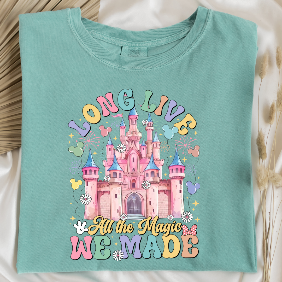 Customized adult comfort colors Chalky mint t-shirt with long live multi color long live bubble letters large castle in the middle with Mickey Mouse shaped balloons and flowers surrounding. Matching crewnecks and hoodies available in youth and adult sizes