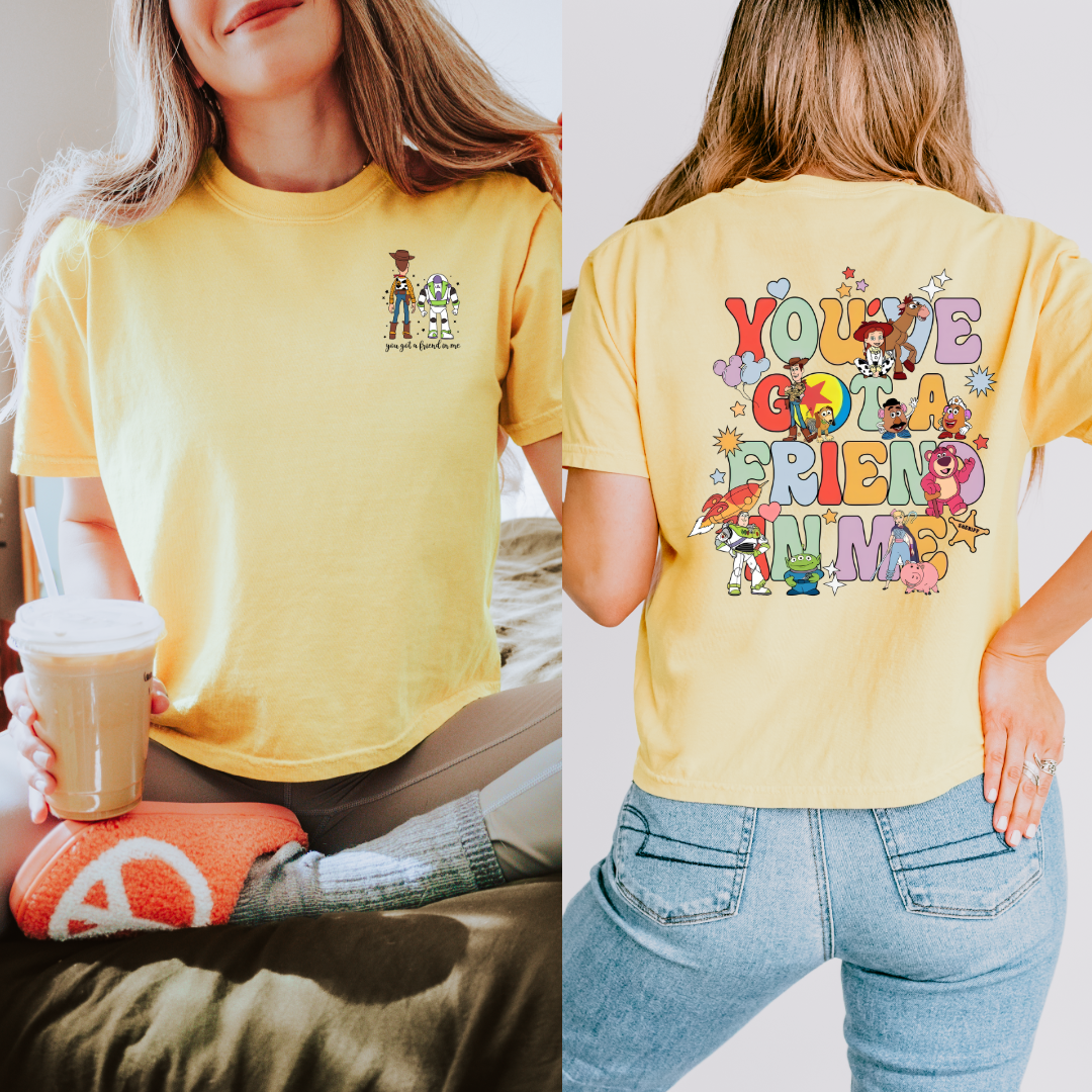 Adult Customized Toy Story Butter Yellowgraphic tee You've got a friend in me bubble letters. Matching Youth Tee and crewneck available.