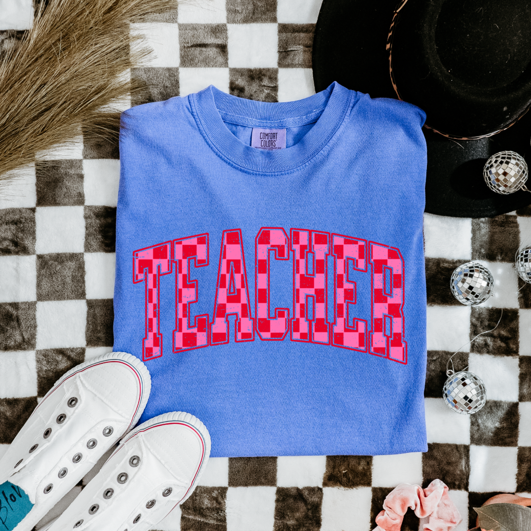 Customized Adult Flo Blue Graphic tee with pink and red checkered teacher varsity font