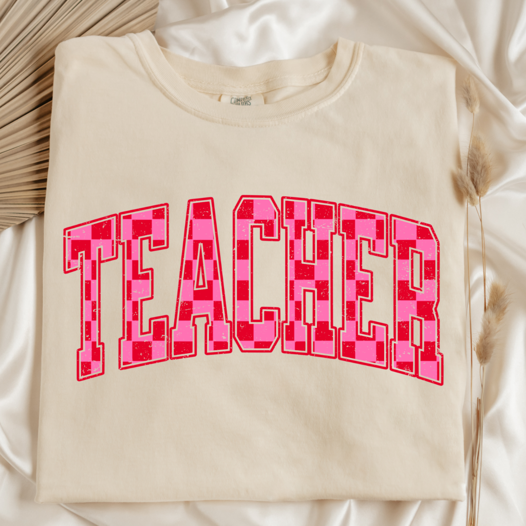 Customized Adult Ivory Graphic tee with pink and red checkered teacher varsity font