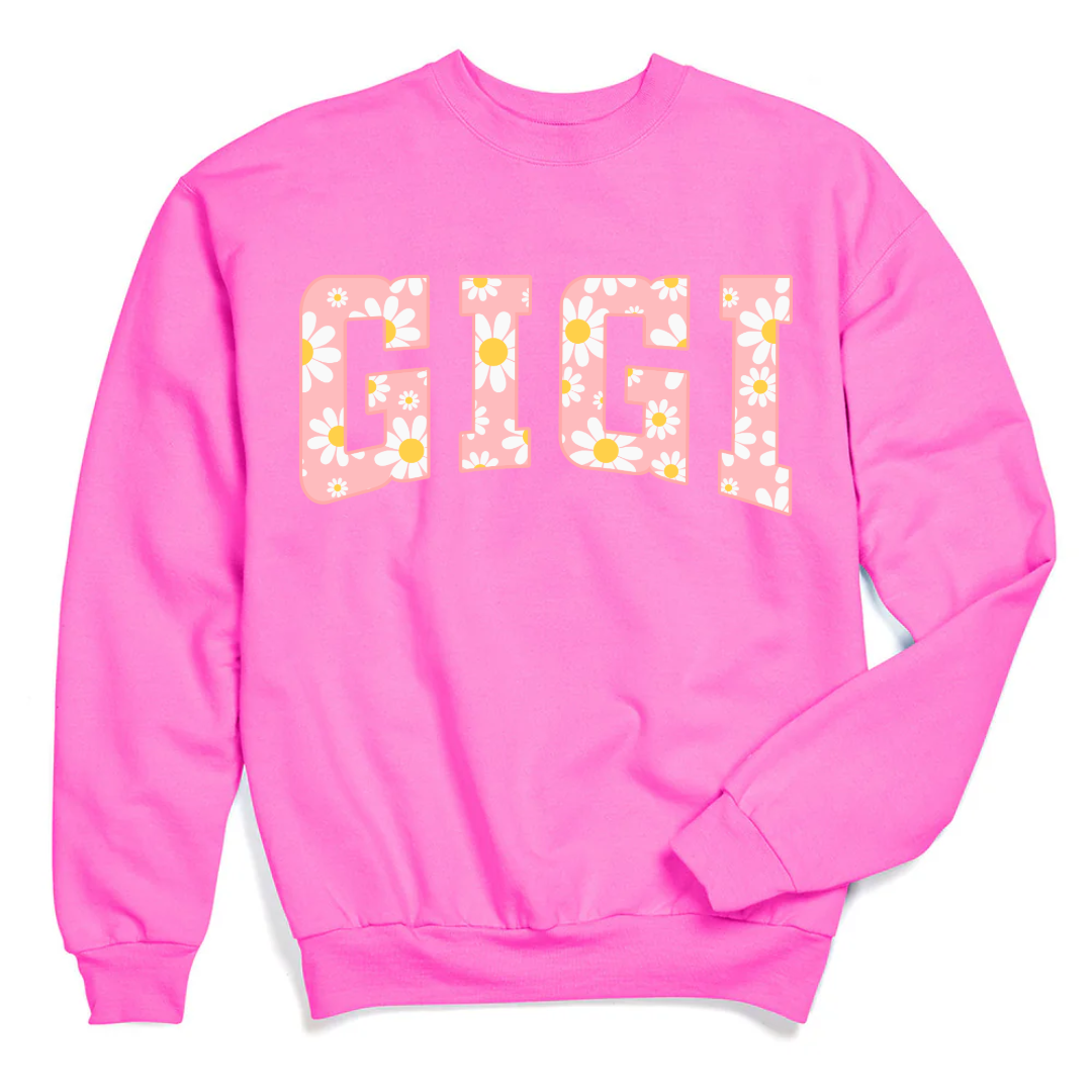 Customized Hot Pink Crewneck with varsity letter font GiGi with yellow and pink daisies Matching mama and mini tee and crewneck available.