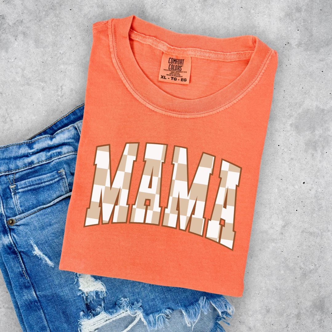 Customized Mama Adult Melon Orange Graphic Tee checkered beige and white Varsity font. Matching Mini Graphic tee and crewnecks available.