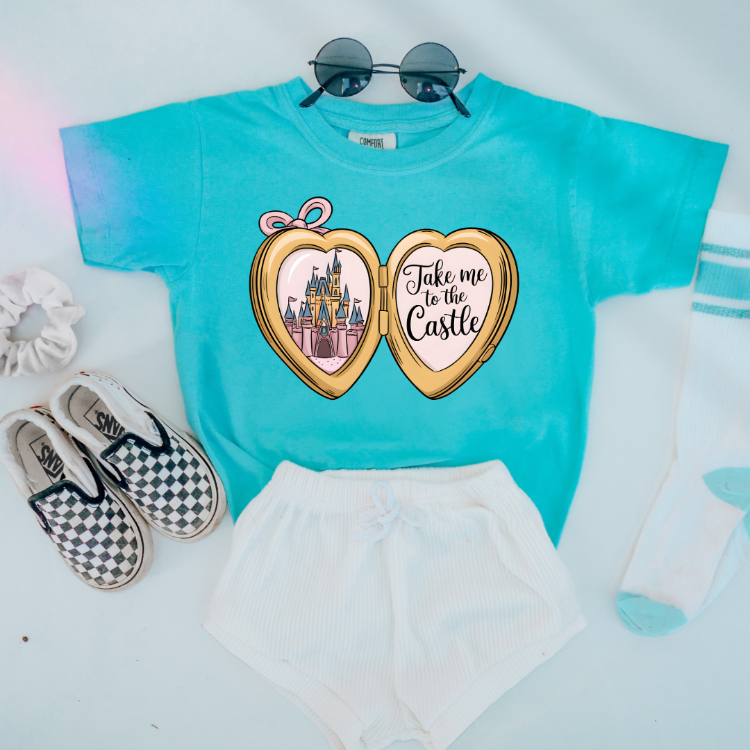 Customized Youth Lagoon Blue Comfort colors Graphic tee with locket castle design on the front Script take me to the castle Disney.