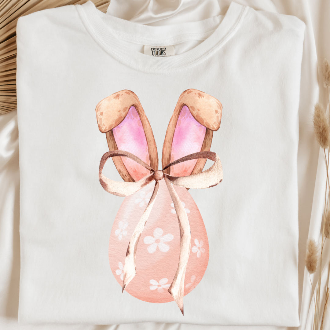 Customized adult comfort colors white watercolor peach egg with white flowers and brown floppy skinny bow and bunny ears matching crewneck and hoodies available In adult and youth sizes