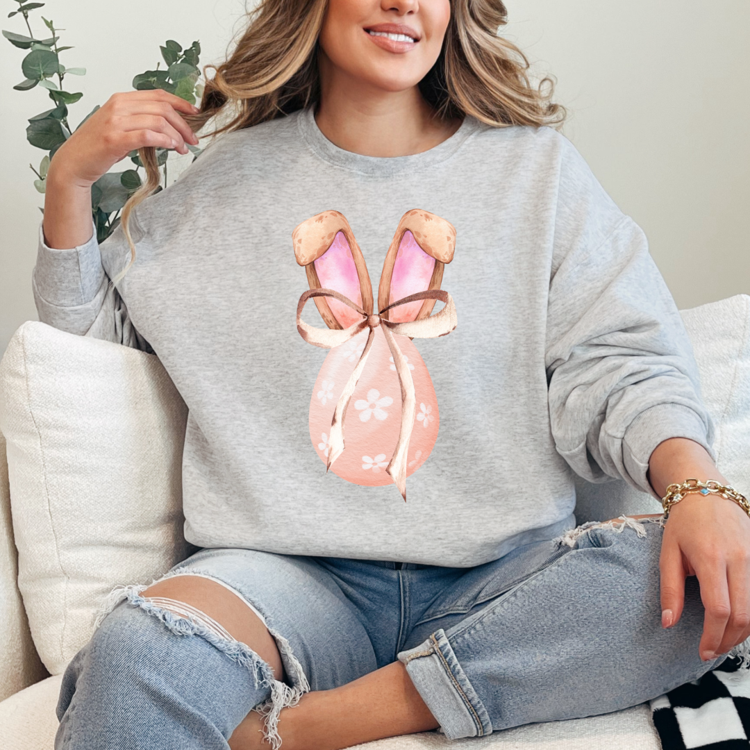 Customized adult grey crewneck watercolor peach egg with white flowers and brown floppy skinny bow and bunny ears matching tees and hoodies available In adult and youth sizes