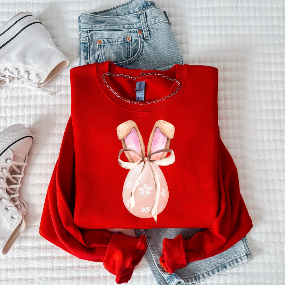 Customized youth red crewneck watercolor peach egg with white flowers, bunny ears with floppy skinny bow matching tees and hoodies available In adult and youth sizes
