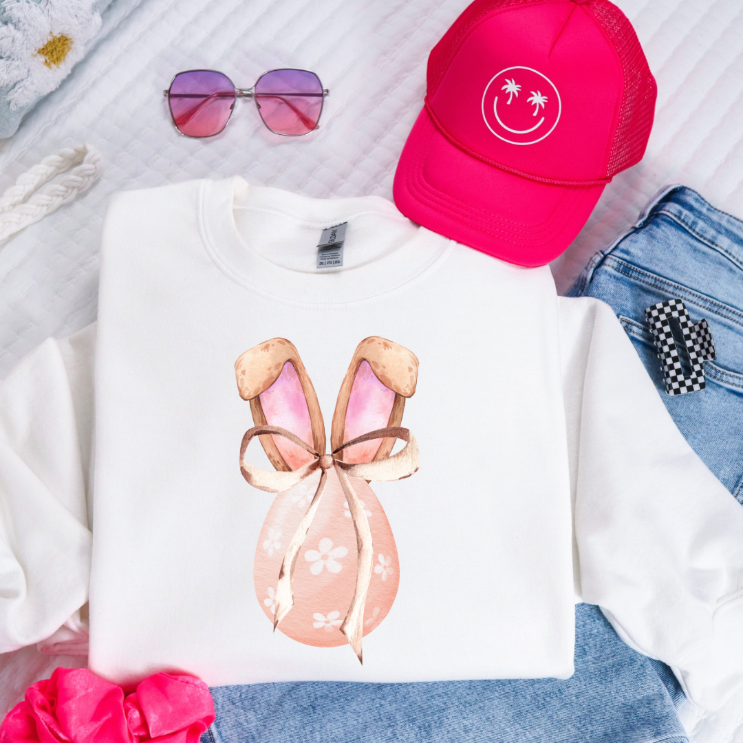 Customized youth white crewneck watercolor peach egg with white flowers, bunny ears with floppy skinny bow matching tees and hoodies available In adult and youth sizes