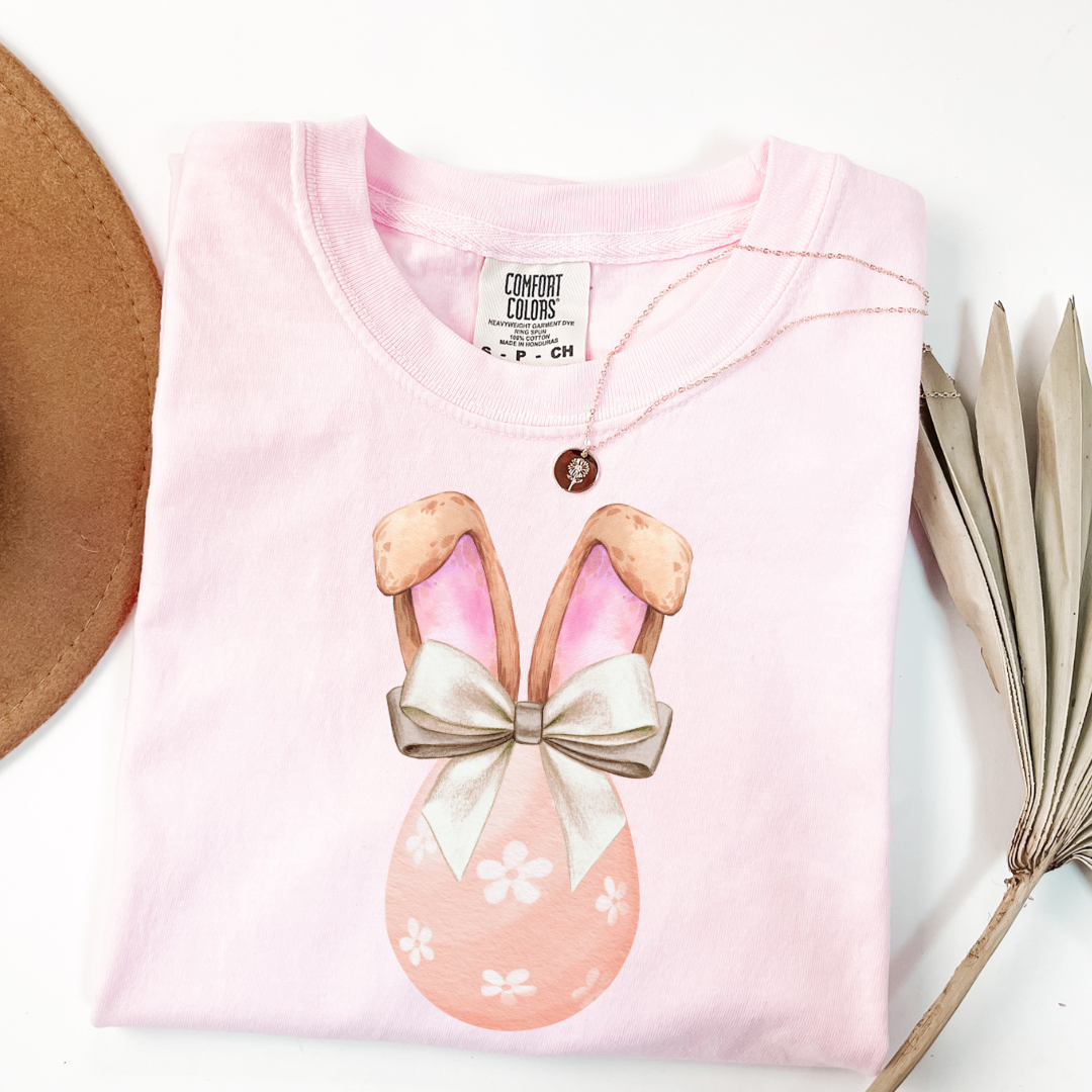 Customized adult comfort colors blossom pink watercolor peach egg with white flowers and champagne wired bow bow and bunny ears matching crewneck and hoodies available in adult and youth sizes