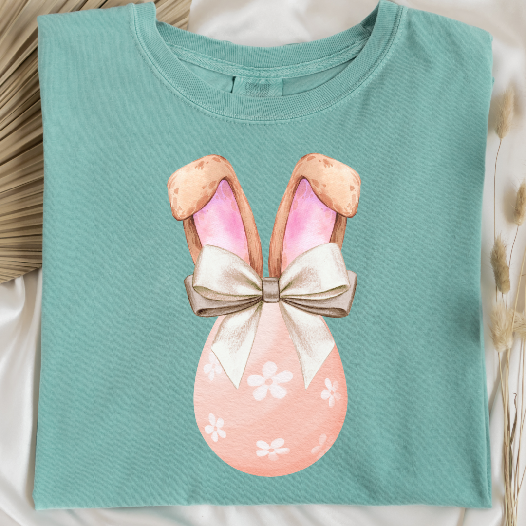 Customized adult comfort colors chalky mint watercolor peach egg with white flowers and champagne wired bow bow and bunny ears matching crewneck and hoodies available in adult and youth sizes