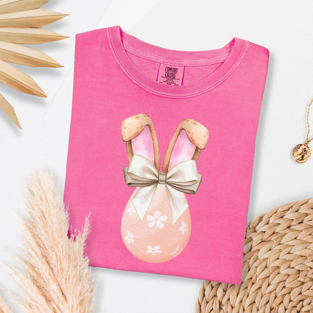Customized adult comfort colors crunchberry pink watercolor peach egg with white flowers and champagne wired bow bow and bunny ears matching crewneck and hoodies available in adult and youth sizes