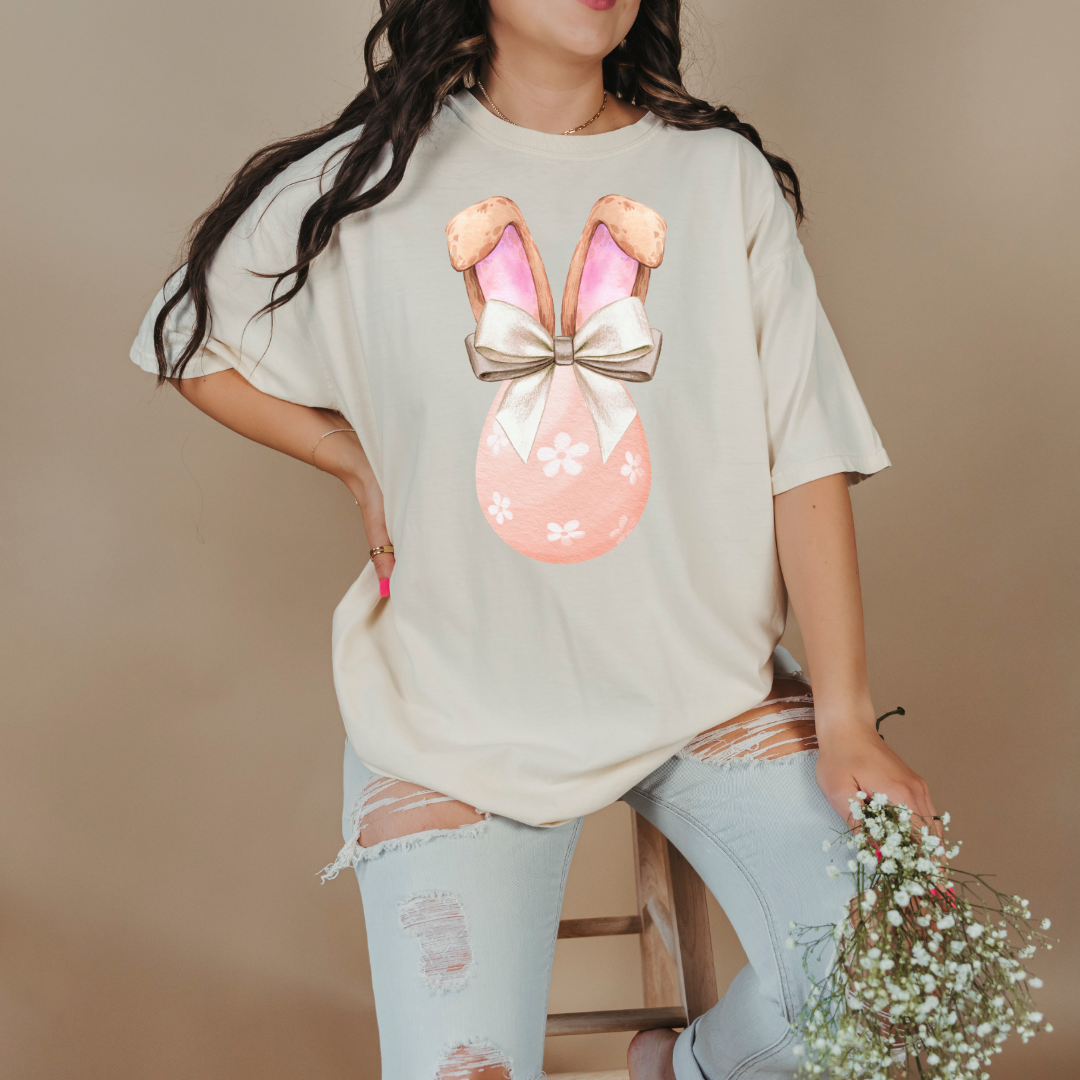 Customized adult comfort colors ivory watercolor peach egg with white flowers and champagne wired bow bow and bunny ears matching crewneck and hoodies available in adult and youth sizes