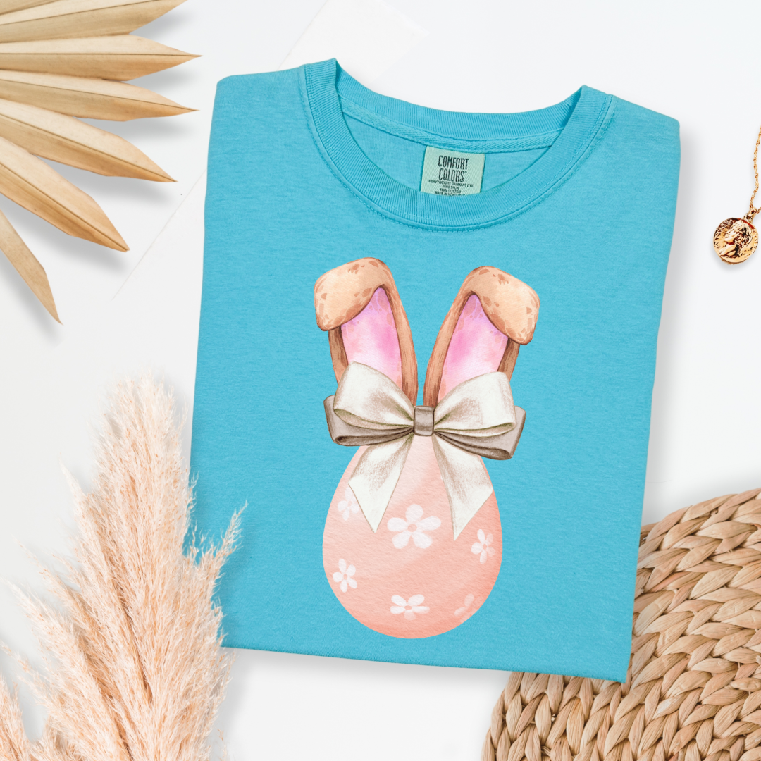 Customized adult comfort colors lagoon blue watercolor peach egg with white flowers and champagne wired bow bow and bunny ears matching crewneck and hoodies available in adult and youth sizes
