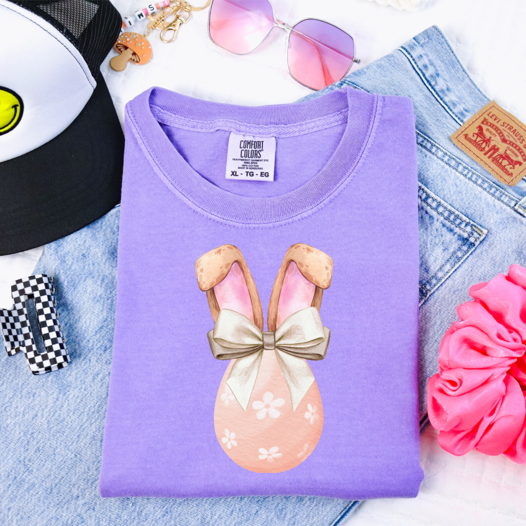 Customized youth comfort colors violet watercolor peach egg with white flowers and champagne wired bow bow and bunny ears matching crewneck and hoodies available in adult and youth sizes