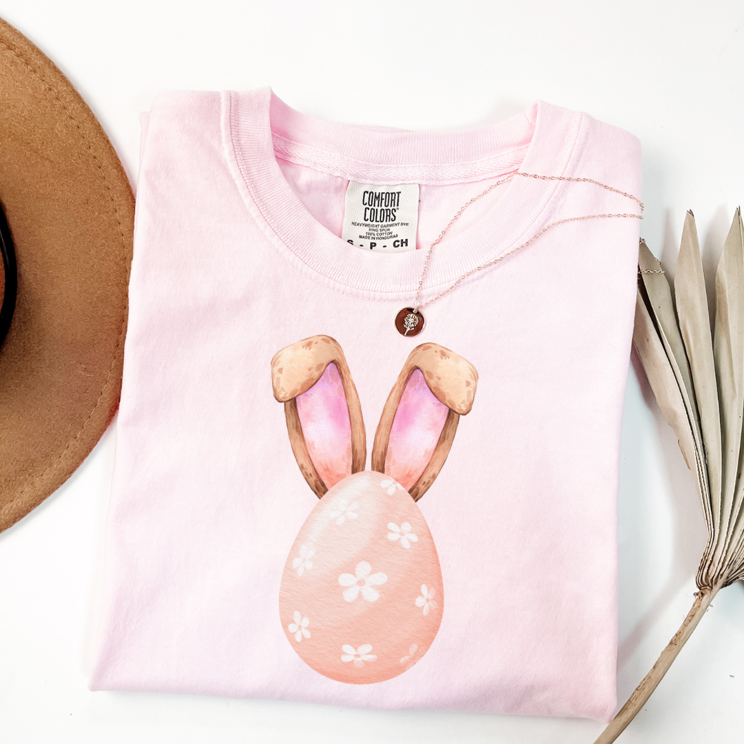 Customized adult comfort colors blossom pink watercolor peach egg with white flowers and bunny ears matching crewneck and hoodies available I’m adult and youth sizes