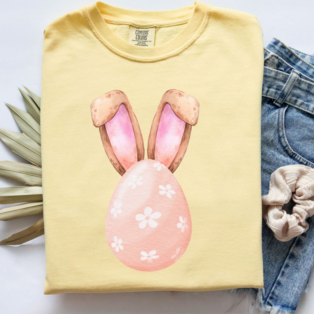 Customized adult comfort colors buttery yellow watercolor peach egg with white flowers and bunny ears matching crewneck and hoodies available I’m adult and youth sizes
