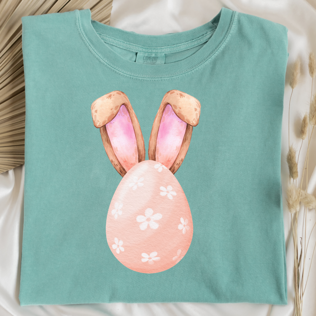 Customized adult comfort colors chalky mint watercolor peach egg with white flowers and bunny ears matching crewneck and hoodies available I’m adult and youth sizes