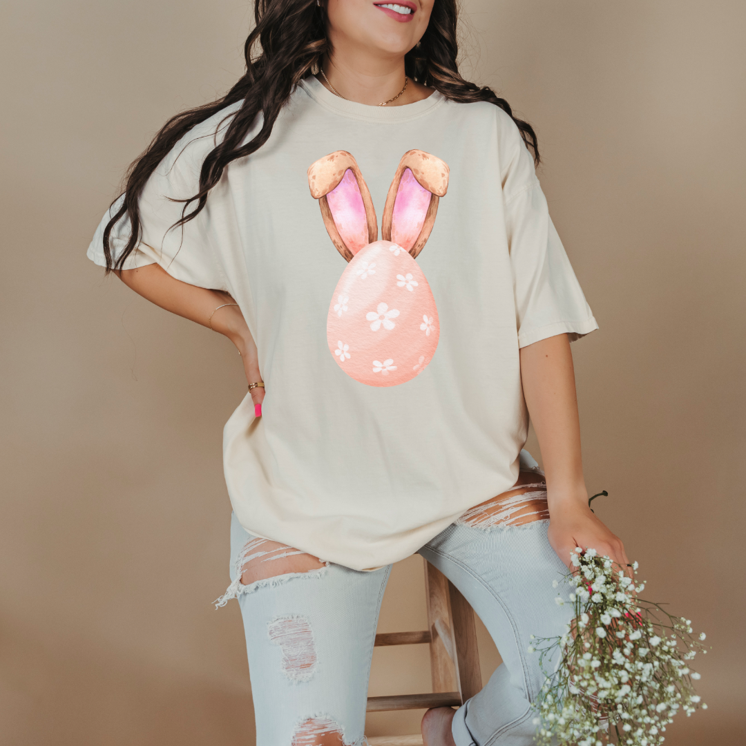 Customized adult comfort colors ivory flat lay watercolor peach egg with white flowers and bunny ears matching crewneck and hoodies available I’m adult and youth sizes