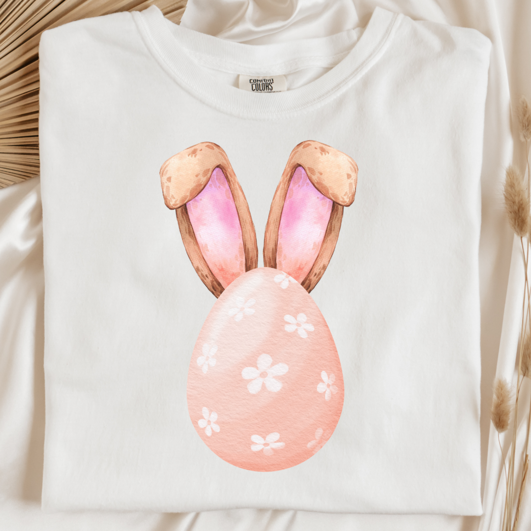 Customized adult comfort colors white watercolor peach egg with white flowers and bunny ears matching crewneck and hoodies available I’m adult and youth sizes