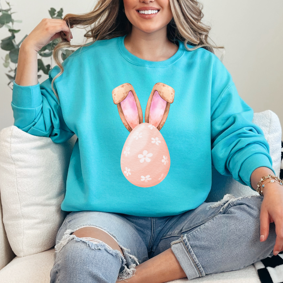 Customized adult lagoon blue crewneck watercolor peach egg with white flowers and bunny ears matching tees and hoodies available In adult and youth sizes