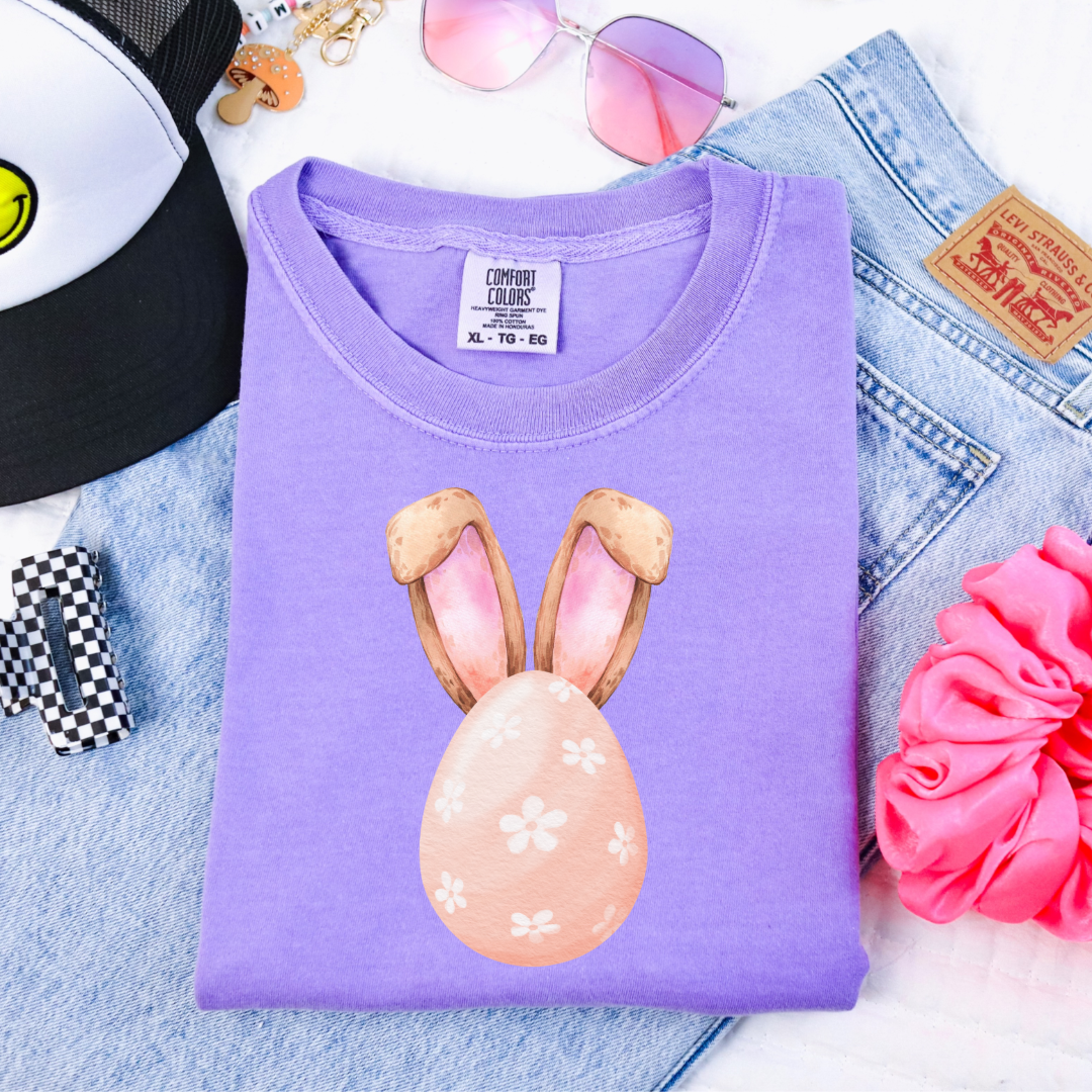 Customized adult comfort colors violet watercolor peach egg with white flowers and bunny ears matching crewneck and hoodies available violet adult and youth sizes