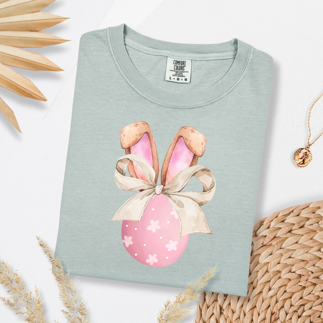 Customized adult comfort colors bay green watercolor peach egg with white flowers and brown floppy skinny bow and bunny ears matching crewneck and hoodies available In adult and youth sizes