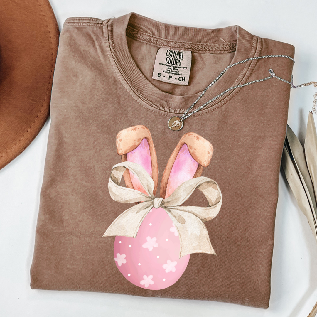 Customized adult comfort colors espresso brown watercolor peach egg with white flowers and brown floppy skinny bow and bunny ears matching crewneck and hoodies available In adult and youth sizes