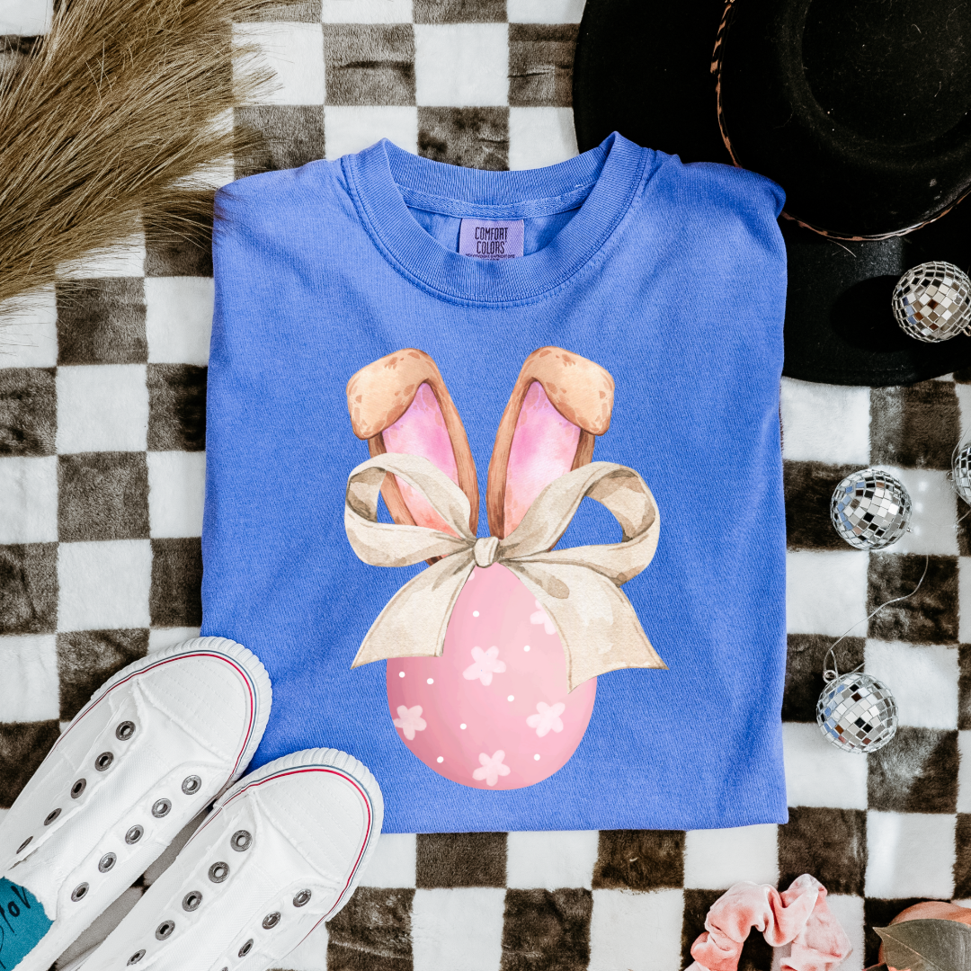 Customized adult/youth comfort colors flo blue watercolor peach egg with white flowers and brown floppy skinny bow and bunny ears matching crewneck and hoodies available In adult and youth sizes