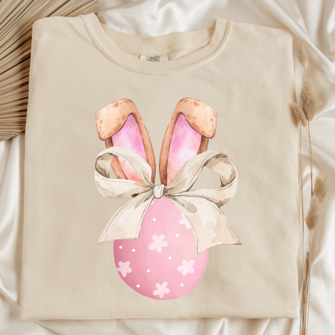 Customized adult comfort colors ivory flat lay watercolor peach egg with white flowers and brown floppy skinny bow and bunny ears matching crewneck and hoodies available In adult and youth sizes