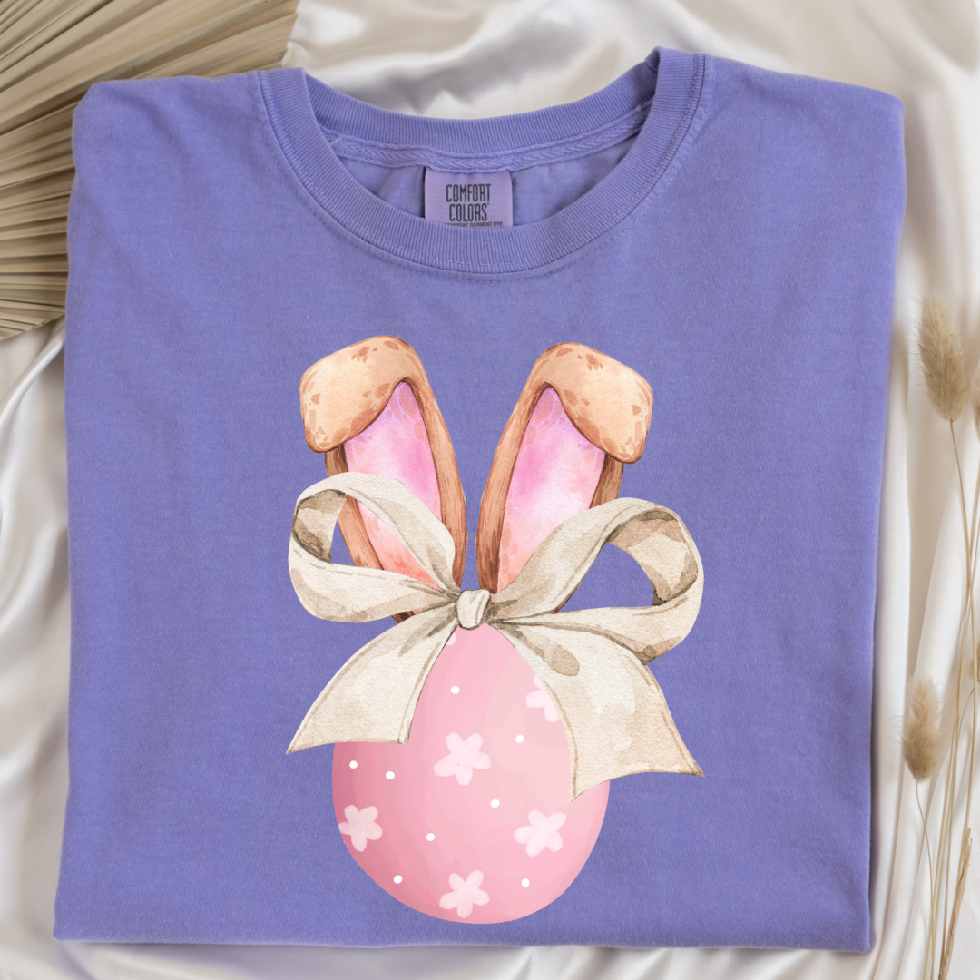 Customized adult comfort colors violet watercolor peach egg with white flowers and brown floppy skinny bow and bunny ears matching crewneck and hoodies available In adult and youth sizes