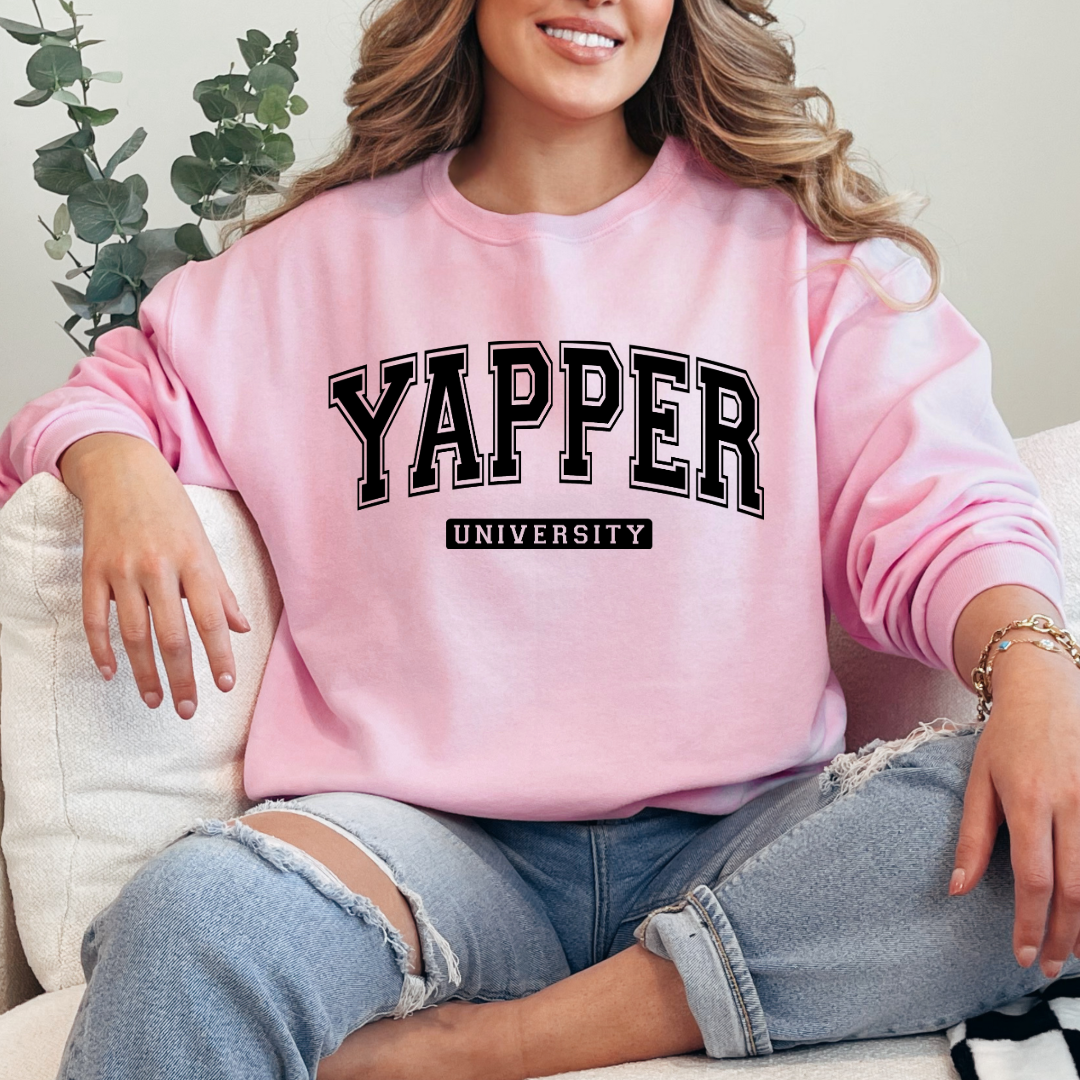 Customized adult Light Pink Crewneck with black varsity lettering yapper university Matching hoodies and Graphic tees in adult and youth sizes available.