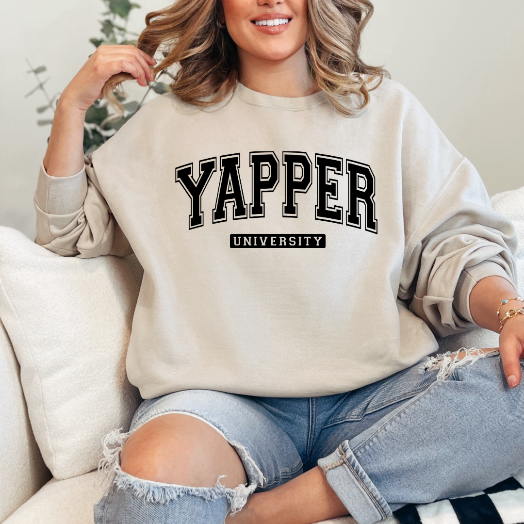 Customized adult beige Crewneck with black varsity lettering yapper university Matching hoodies and Graphic tees in adult and youth sizes available.