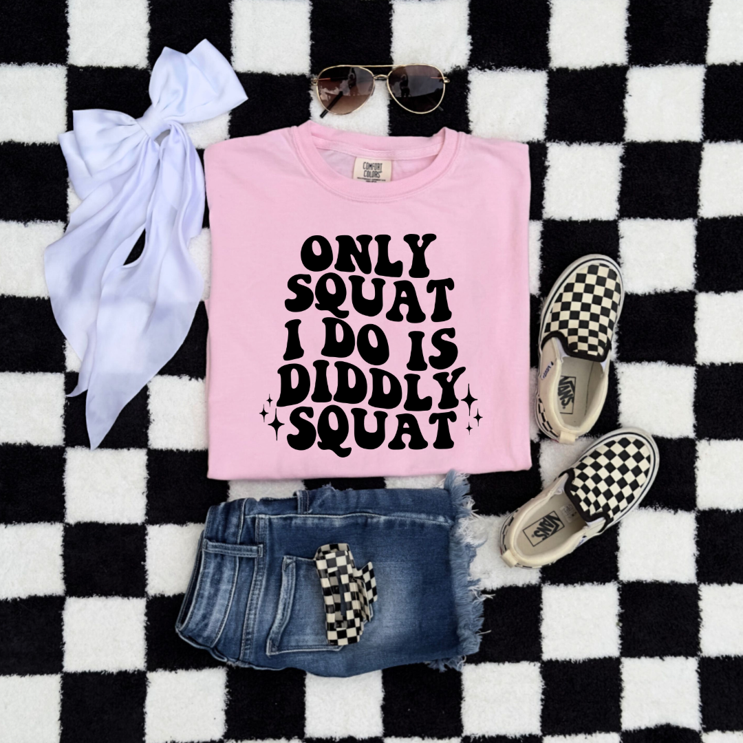 Customized Youth Comfort Colors Blossom Pink Flat Lay graphic tee with bubble letters only squat I do is diddly squat with 3 twinkles on each side. Matching hoodies and crewnecks in youth and adult sizes available.