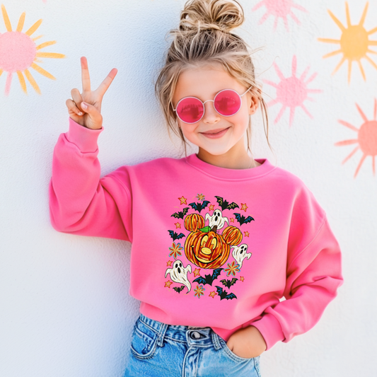 Youth Safety Pink Crewneck with Dimensional Mickey Mouse pumpkin head with ghosts, bows and bats. This Design Is available in Youth sizes Small through XL. Minnie Mouse available as well