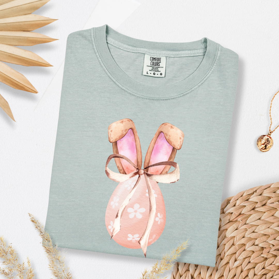 Customized adult comfort colors bay green watercolor peach egg with white flowers and brown floppy skinny bow and bunny ears matching crewneck and hoodies available adult and youth sizes