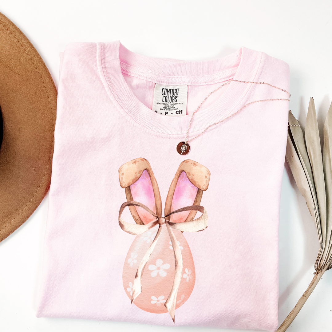 Customized adult comfort colors blossom pink watercolor peach egg with white flowers and brown floppy skinny bow and bunny ears matching crewneck and hoodies available In adult and youth sizes