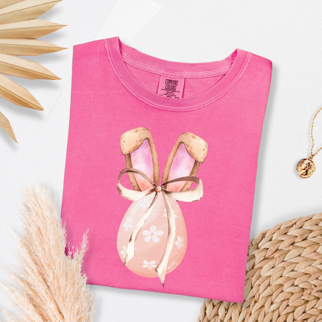 Customized adult comfort colors crunchberry pink watercolor peach egg with white flowers and brown floppy skinny bow and bunny ears matching crewneck and hoodies available In adult and youth sizes