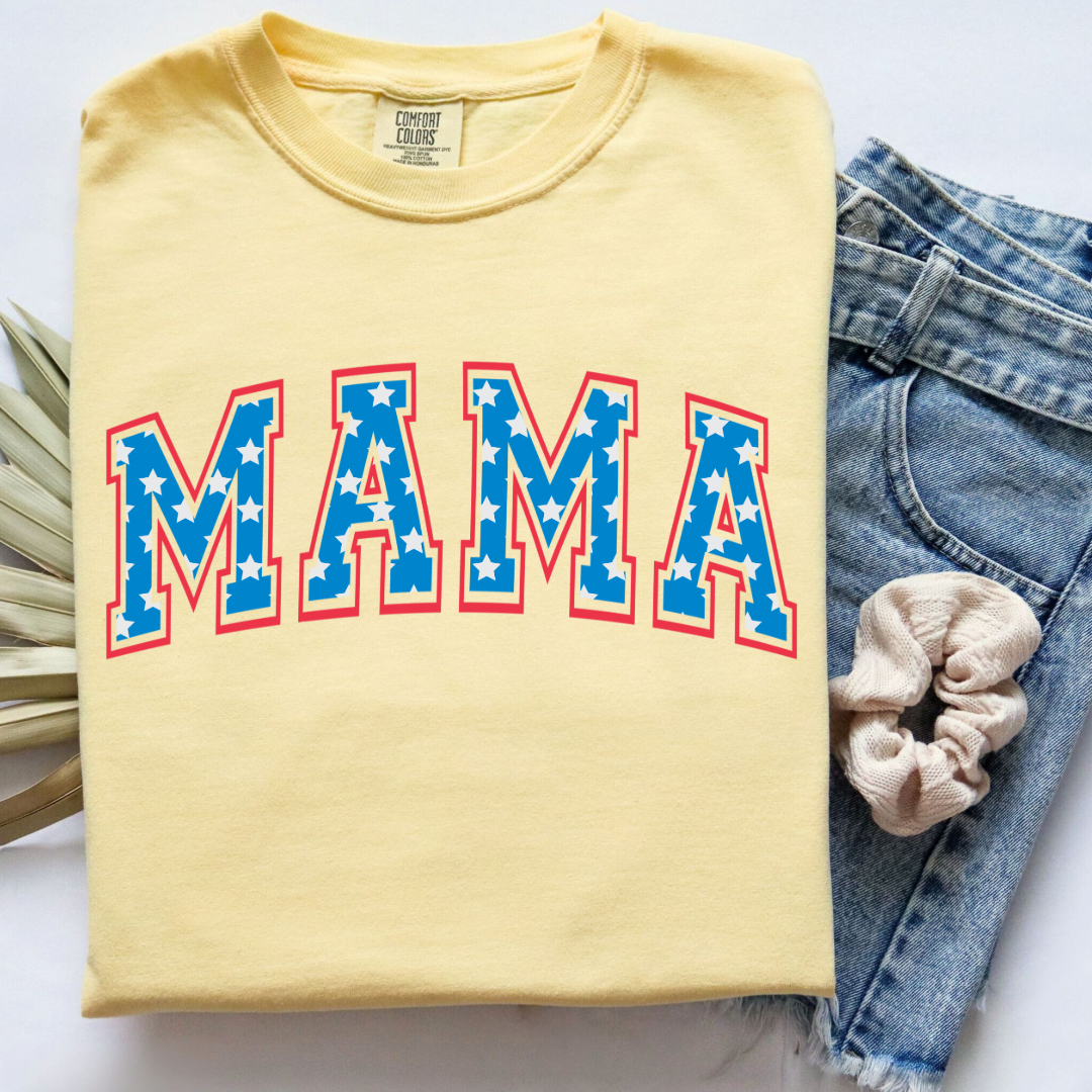 Customized adult Comfort Colors Butter Yellow Graphic Tee with Seasonal 4th of July University style Font MAMA blue with white stars outlined un red , This style is available in adult Graphic Tees as well as adult crewnecks and hoodies .Available In DAD, MAMA and MINI.
