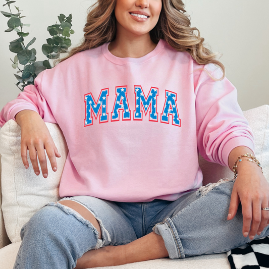 Customized adult Light Pink Crewneck with Seasonal 4th of July University style Font MAMA blue with white stars outlined un red , This style is available in adult  Graphic Tees as well as adult crewnecks and hoodies .Available In DAD, MAMA and MINI.