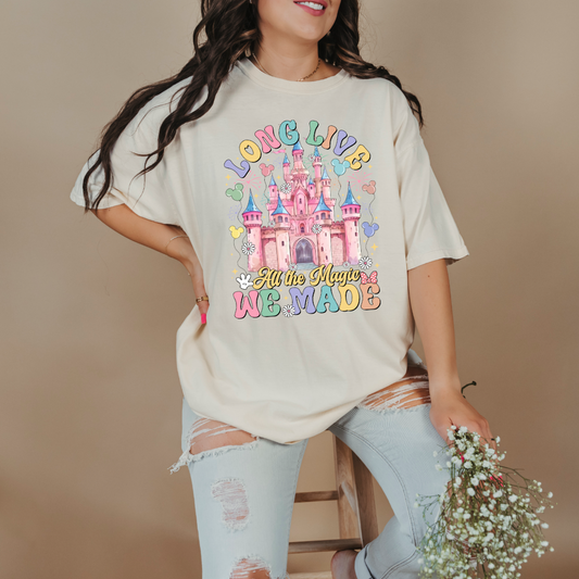 Customized adult comfort colors Ivory t-shirt with long live multi color long live bubble letters large castle in the middle with Mickey Mouse shaped balloons and flowers surrounding. Matching crewnecks and hoodies available in youth and adult sizes 