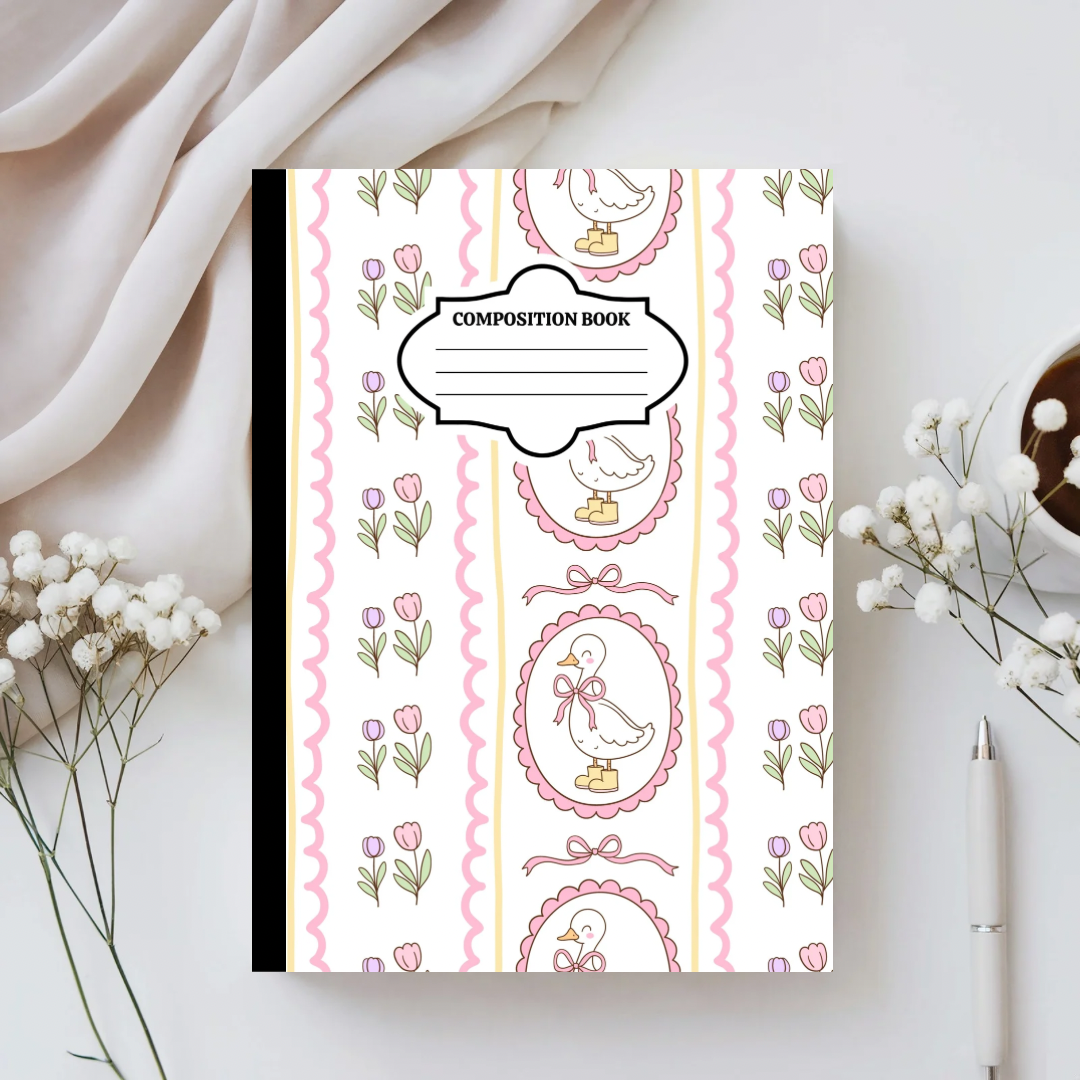 Composition book with decorative cover featuring birds and flowers on a light background
