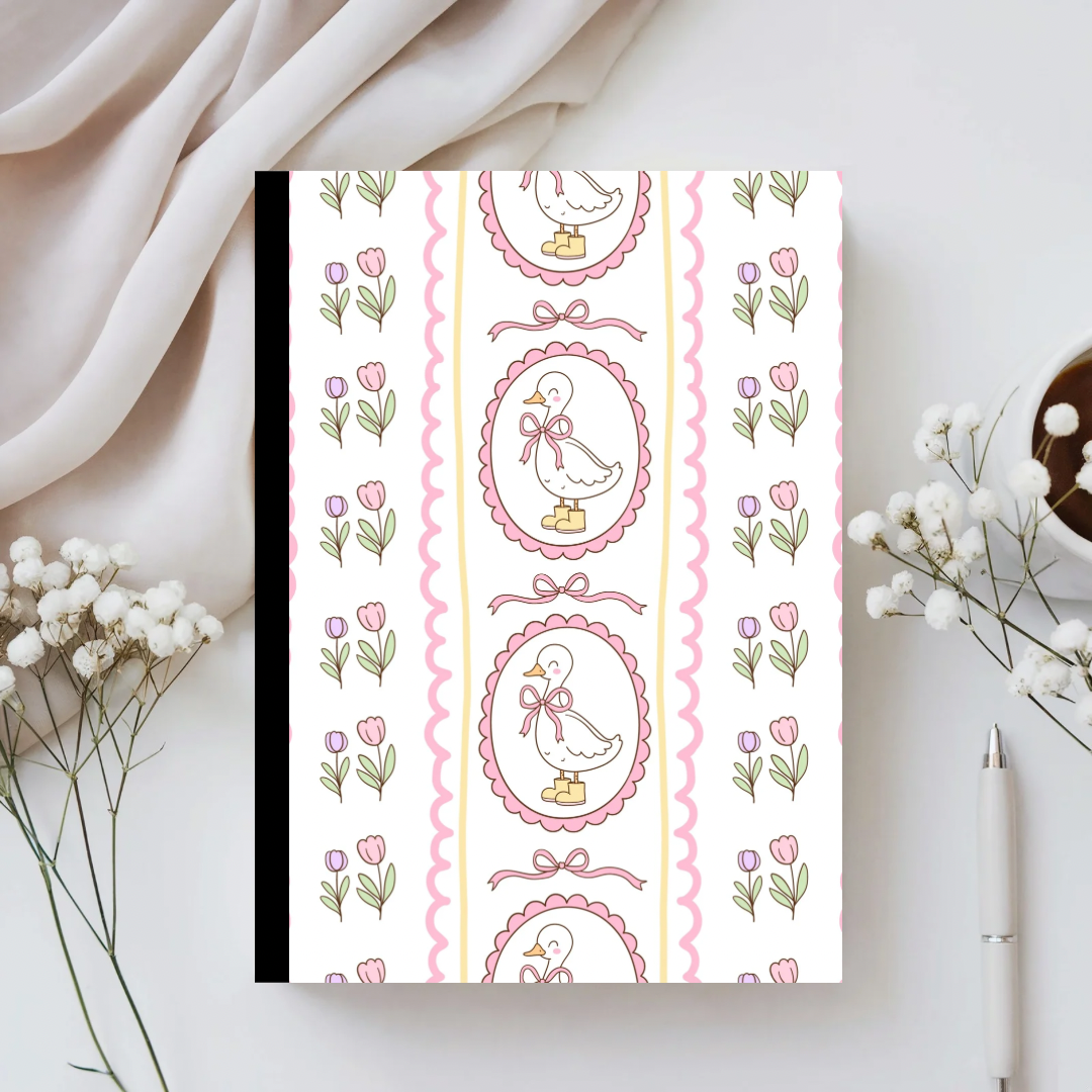 Notebook with decorative duck and flower pattern on a light background