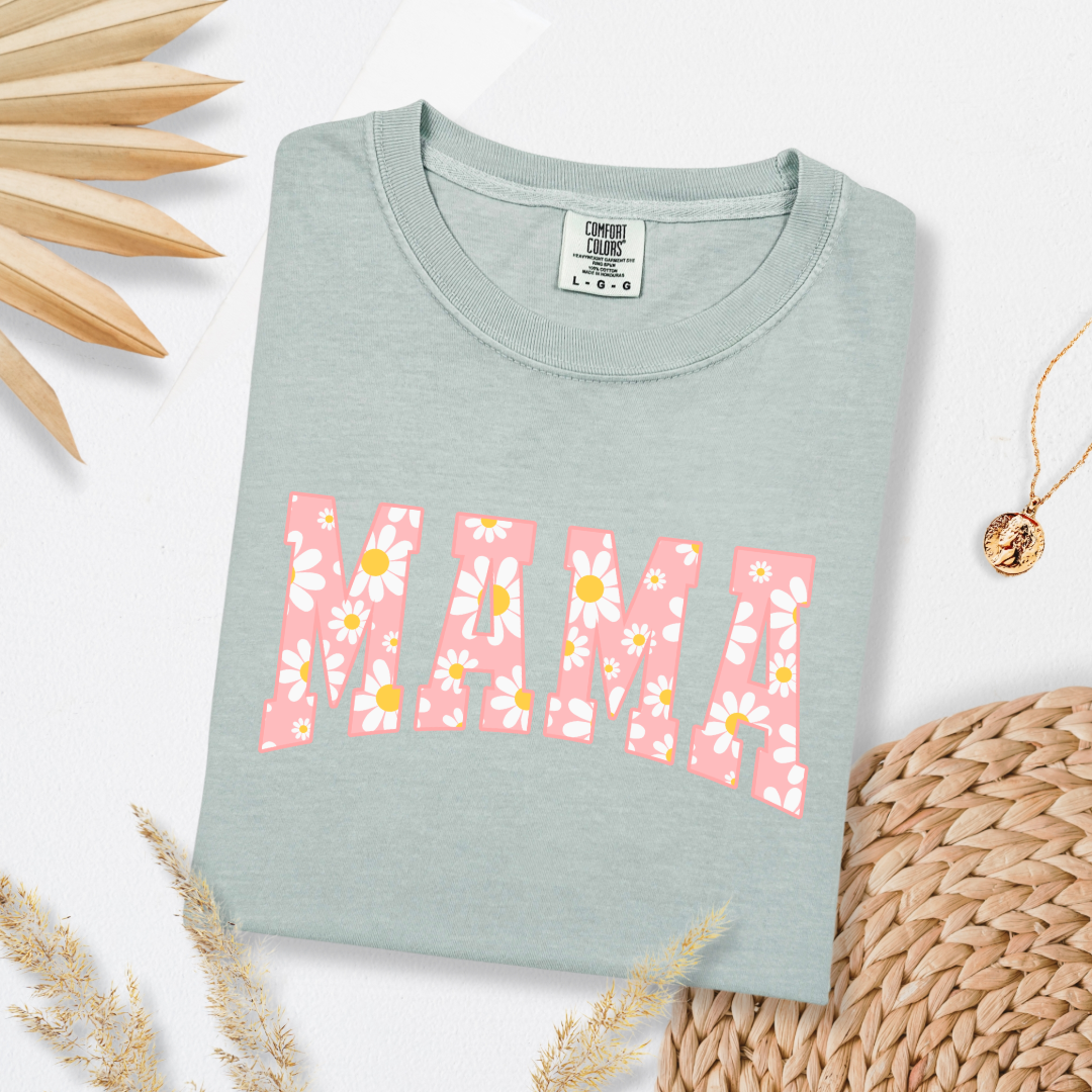 Customized Adult Bay Green Graphic tee with varsity letter font Mama with yellow and pink daisies Matching mini tee and crewneck available. 