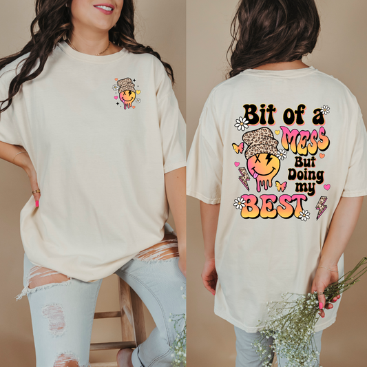 Customized Ivory Adult Graphic tee with black orange, pink and cheetah print font little bit of a mess but doing my best. Smiley face on back and front 