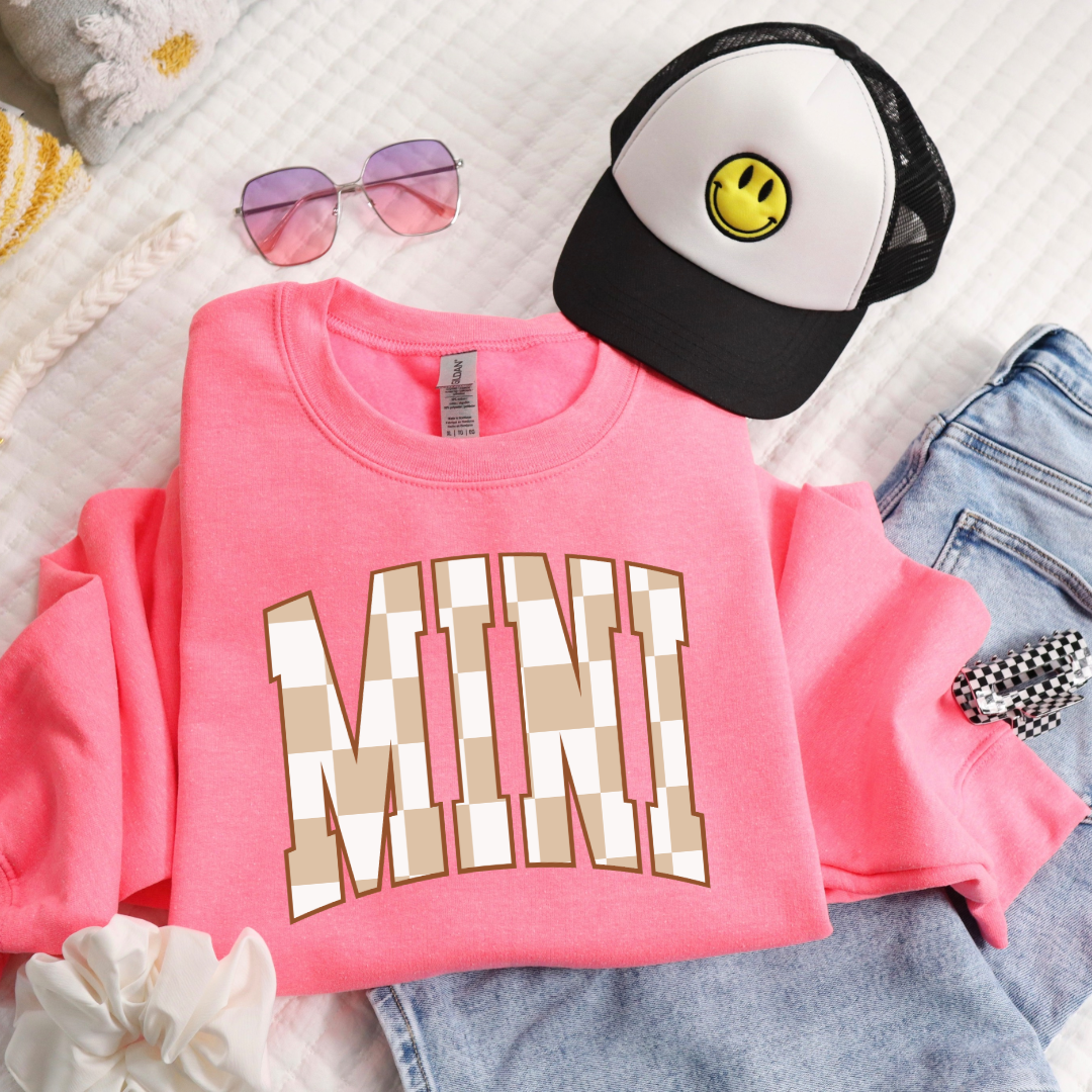 Customized pink flat lay youth crewneck tan and white checkered Mini Matching mama Crewnecks and graphic Tees available 
