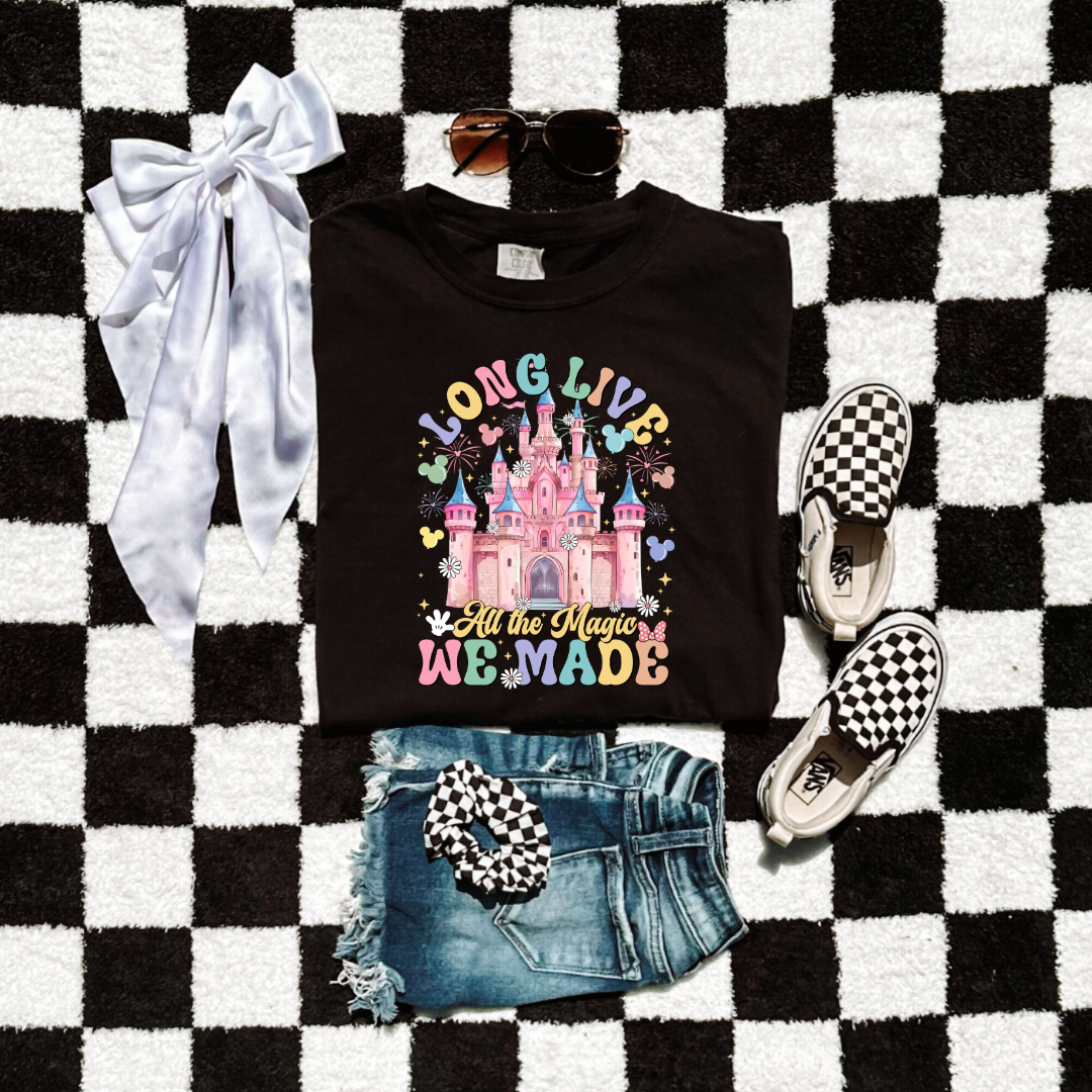 Customized Youth comfort colors black t-shirt with long live multi color long live bubble letters large castle in the middle with Mickey Mouse shaped balloons and flowers surrounding. Matching crewnecks and hoodies available in youth and adult sizes 