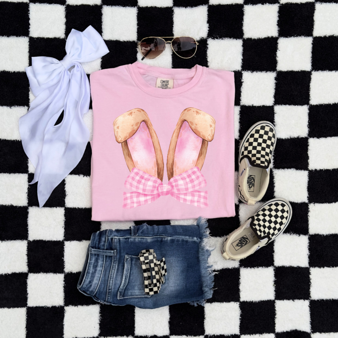 Customized bunny ears silhouette with pink gingham bow watercolor youth blossom pink flat lay comfort colors graphic tee matching adult available