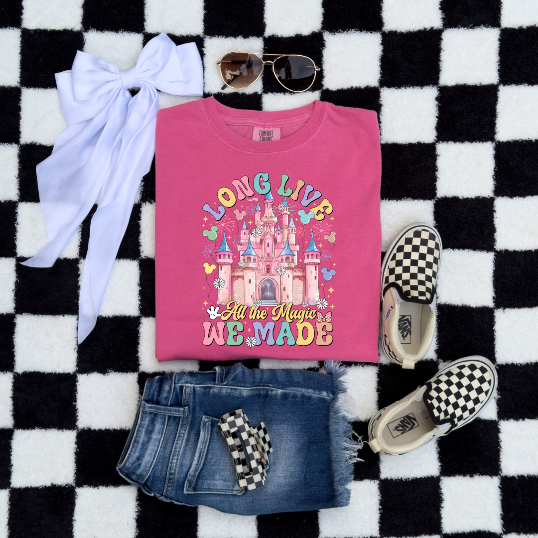 Customized Youth comfort colors crunchberry pink t-shirt with long live multi color long live bubble letters large castle in the middle with Mickey Mouse shaped balloons and flowers surrounding. Matching crewnecks and hoodies available in youth and adult sizes 