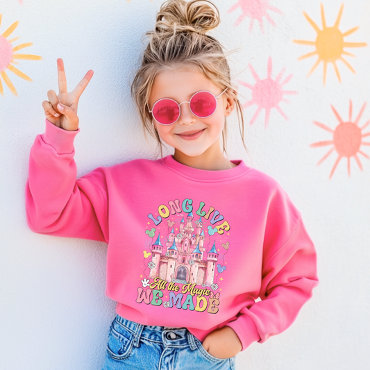 Customized youth hot pink crewneck with long live multi color long live bubble letters large castle in the middle with Mickey Mouse shaped balloons and flowers surrounding. Matching t-shirts and hoodies available in youth and adult sizes 