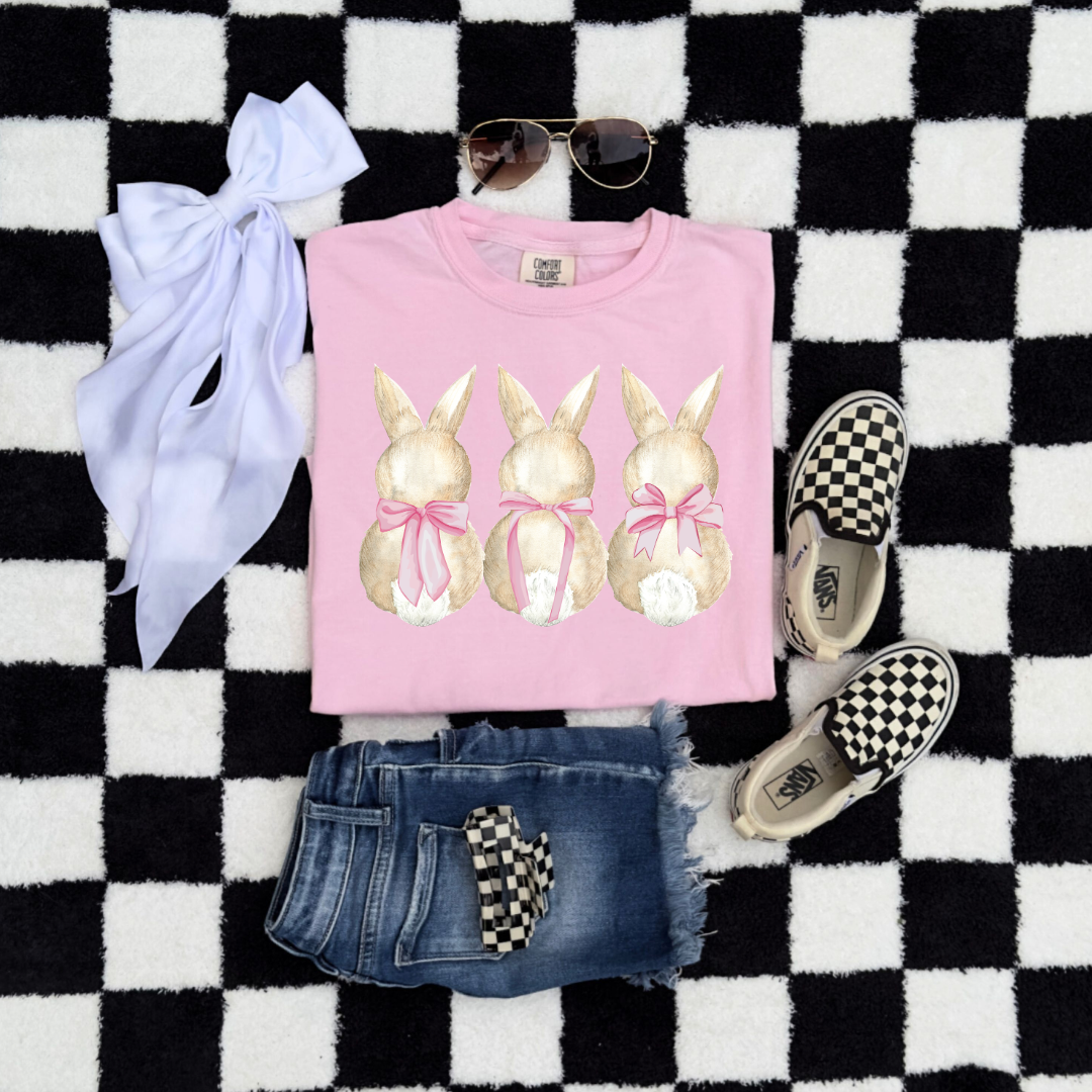 Customized faceless bunny x 3 with bows watercolor youth comfort colors blossom pink flat lay graphic tee matching adult available